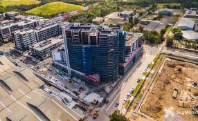 Aerial image of a large building site with scaffolding