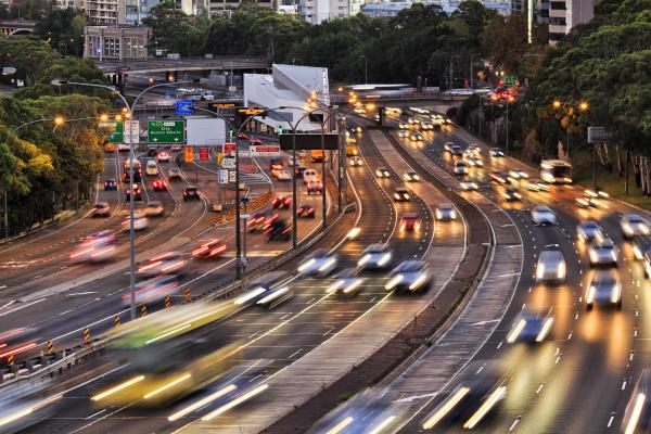 Image of early evening multi-lane traffic