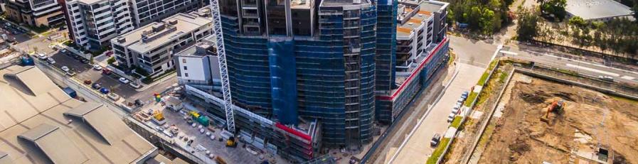 Aerial image of a large building site with scaffolding