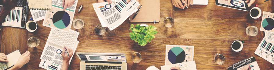 image of a group of people at a table working