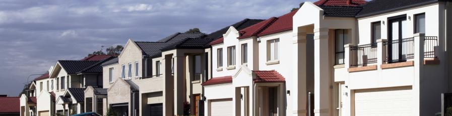 Image of a row of double story residential buildings